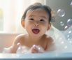 portrait adorable newborn baby taking bath 1 103x86